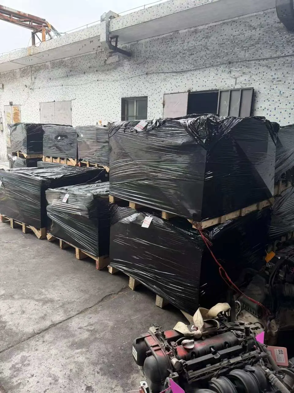 Export-grade crated and wrapped engine pallets