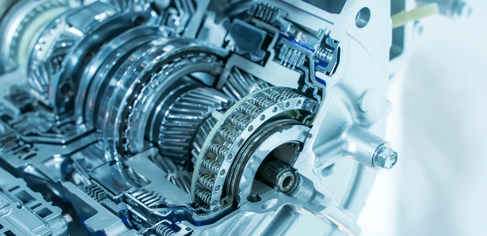 Sectioned automatic transmission showing the gear train and clutch packs — reference photo